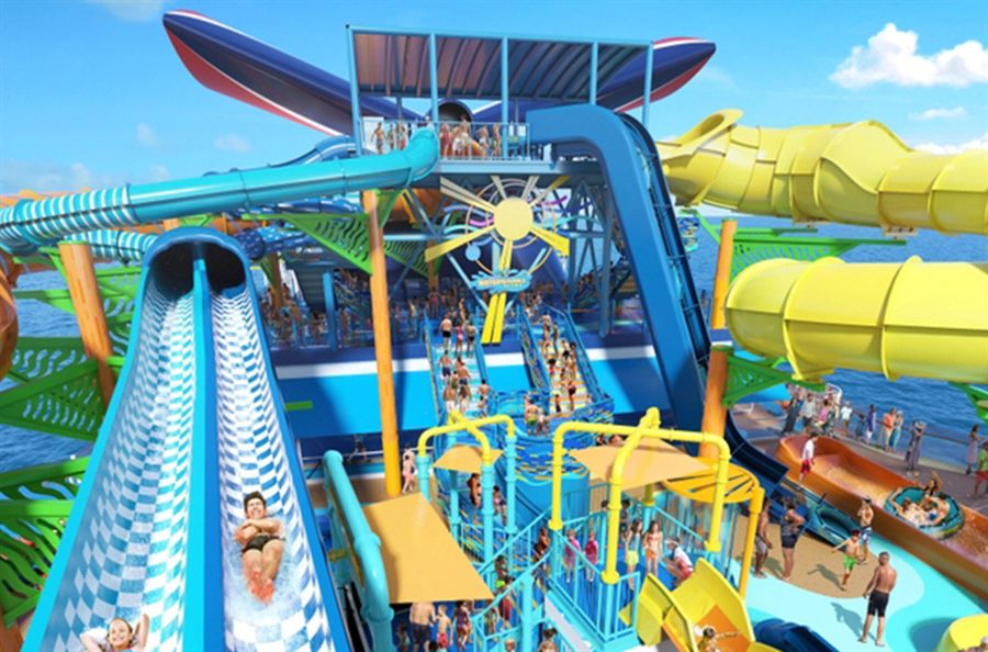 Colorful water slides and splash area on the top deck of a ship